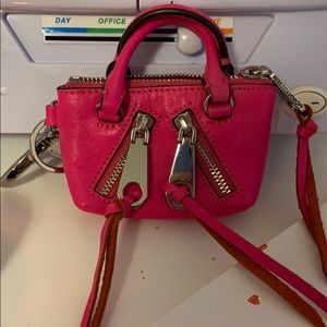Pink mini purse with clip on attachment